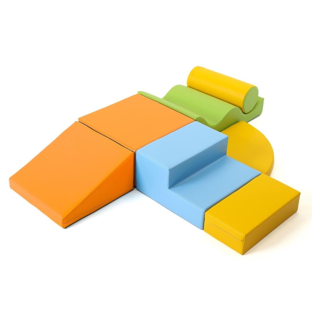 Light multicolored soft play set arranged by various shapes, including wedges, steps, squares, and more