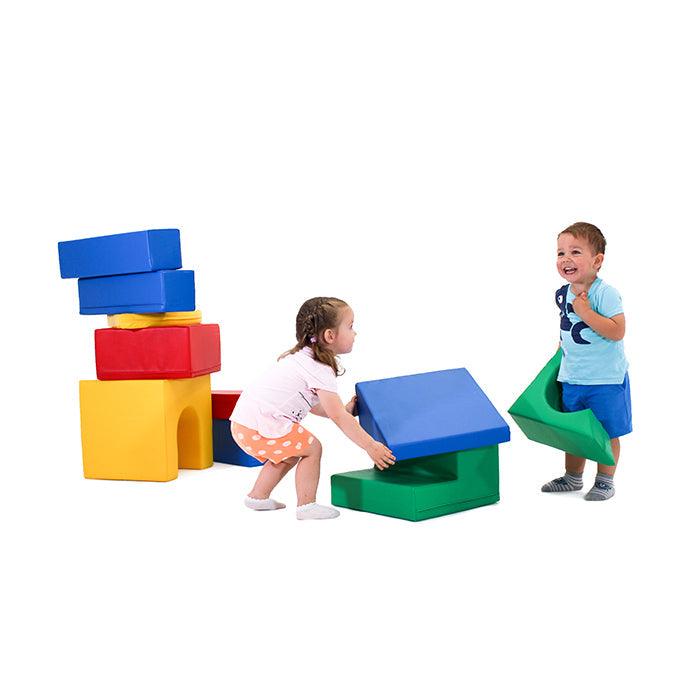 A boy and a girl playing with their IGLU set