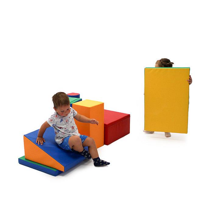 Kids playing with a soft play foam block set