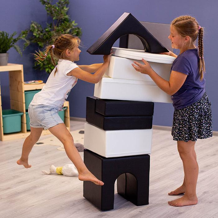 Two girls engaging in imaginative play with an IGLU Soft Play Multifunctional Foam Play Set - Creativity.