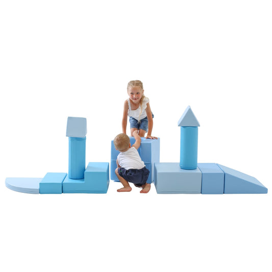 Two happy kids playing around a light blue soft play castle made from towers, wedges, steps and square shapes