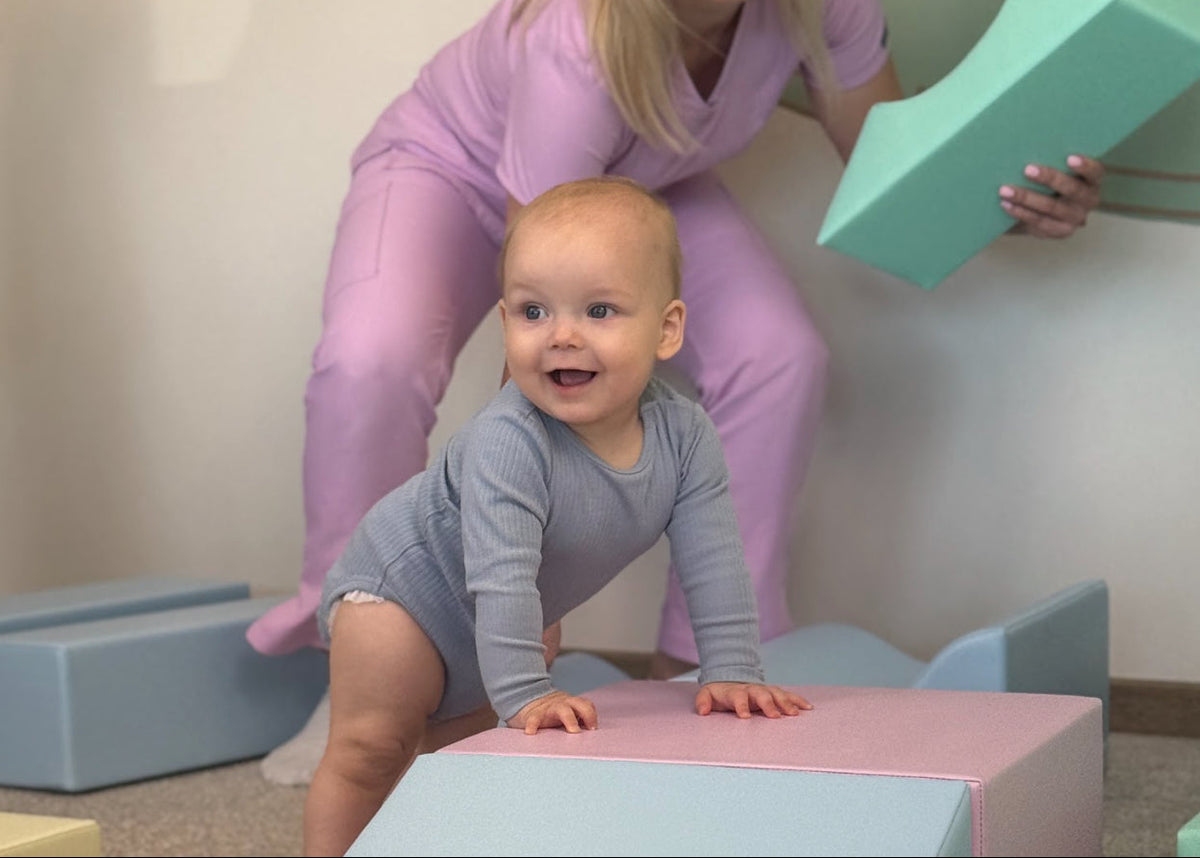 Toddler pulling up on furniture
