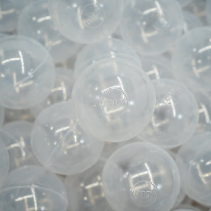 Lots of transparent large plastic ball pit balls.