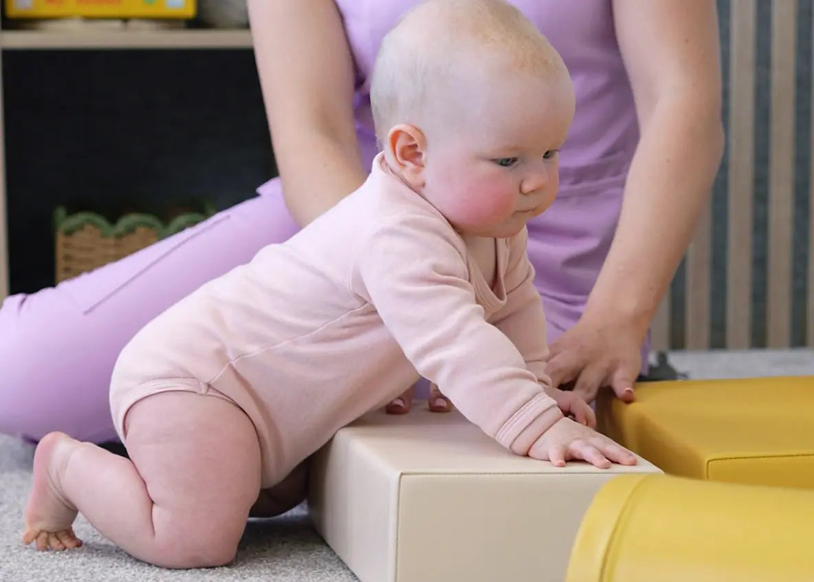 Baby crawling on hands and knees